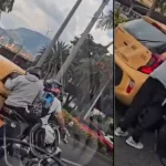 Impactante robo a mano armada en Medellín queda en video: delincuentes en moto interceptaron taxi a plena luz del día